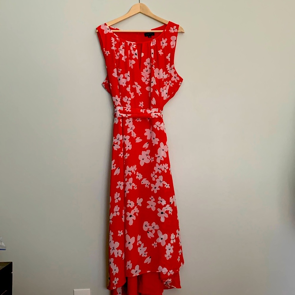 Red Tahari mid-length dress with white poppies.